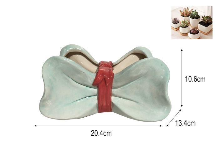 Macetas de cerámica, colores verde y rosado